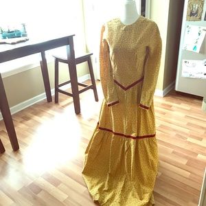 Floor length yellow and red prairie dress